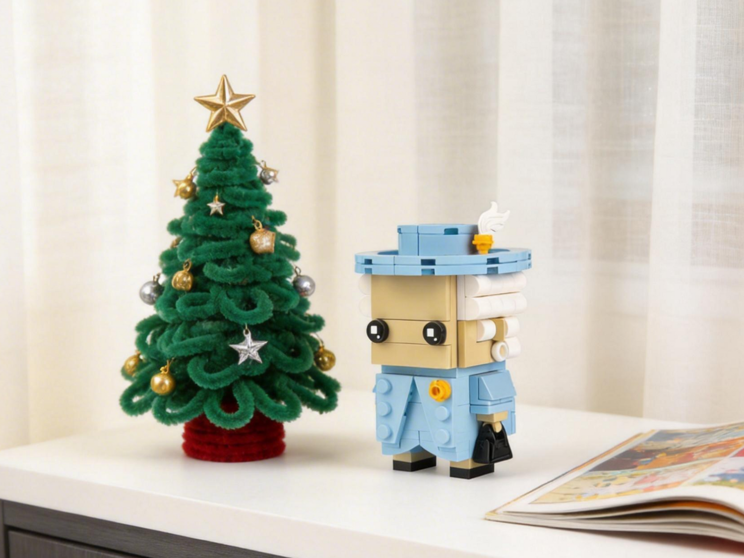 Bloxday Queen of Blocks by a tiny Christmas tree decoration